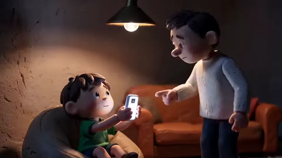 A clay parent pleads with a child absorbed in a phone